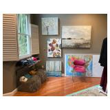 Desk, hats, artwork and chair