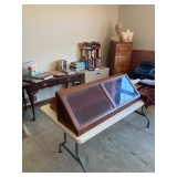 Display case, filing cabinets and books
