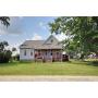 3 Bedroom Country Home features Horse Barn with 5 Stalls and additional Barn on 1.46 Acres