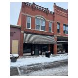4,000sqft Commercial Building with Retail Space on Main, 2 Bed Apartment Upstairs and Full Basement 