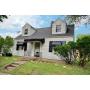 Charming 2 Bed Home in Woodhurst Neighborhood on Full Basement with 2 Car Garage and Loads of Possib