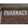 METAL PHARMACY SIGN 95 X 21 MUST BRING TOOLS AND LADDER TO REMOVE