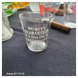 Antique pre-Prohibition era shot glass from W.R. Riley Distilling Co. of Kansas City, Missouri