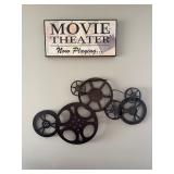 Bronze Metal Movie Reel Wall Art piece featuring various sizes of film reels connected together
