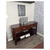 American Signature sofa and console table with two drawers and an open storage shelf. 