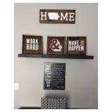 wall art displays motivational quotes focused on productivity and passion