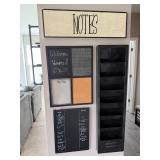 functional home decor family command center which features a combination of a chalkboard, corkboard,