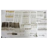 1085	TIFFANY STERLING SILVER *WINTHROP* FLATWARE SET, 152.17 OZT, INCLUDING 12-10 1/4 IN DINNER KNIVES, 12-7 1/2 IN FORKS, 8-9 1/4 IN KNIVES, 9-6 3/4 IN FORKS, 8-7 IN SALAD FORKS, 18 TEASPOONS, 6 OYST