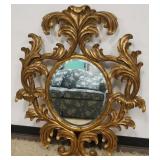 1122	LARGE CONTEMPORARY CARVED WOOD BEVELED EDGE MIRROR WITH GILT FINISH, MARKED ON BACK DAUPHONE HARRISON & GIL, APPROXIMATELY 37 IN X 49 IN H