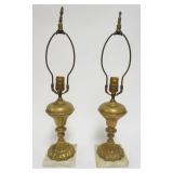1023	PAIR OF EMBOSSED BRASS LAMPS ON MARBLE BASES, EACH APPROXIMATELY 22 IN H
