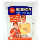 1187	VINTAGE GILBERT MICROSCOPE LAB SETK GILBERT HALL OF SCIENCE, APPROXIMATELY 10 IN X 4 IN X 14 IN