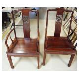 1192	PAIR OF ROSEWOOD PIERCED CARVED BIRD AND FLOWER ARM CHAIRS