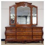 1196	CENTURY 9 DRAWER BOMBE CHEST WITH TRIPLE BEVELED MIRROR, APPROXIMATELY 75 IN X 19 IN X 87 IN H