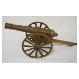 1020	BRASS MODEL CANON, APPROXIMATELY 16 IN X 6 IN X 9 IN HIGH