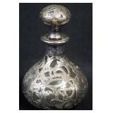 1090	ANTIQUE SILVER OVERLAY TOOLED PERFUME BOTTLE, APPROXIMATELY 4 3/4 IN H