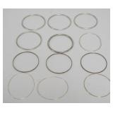 1136	12 LADIES BANGLE BRACELETS