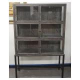 1179	2 PART CURIO CABINET ON METAL BASE, APPROXIMATELY 45 IN X 16 IN X 69 IN H