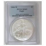 1033	EAGLE SILVER DOLLAR 2006-W