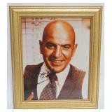 1026	TELLY SAVALAS FRAMED PHOTO, SIGNED SIGNATURE ATTRIBUTED TO TELLY SAVALAS, APPROXIMATELY 10 IN X