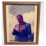1042	JACKIE GLEASON FRAMED ATTRIBUTED SIGNATURE ON PHOTO, APPROXIMATELY 10 IN X 11 IN OVERALL