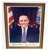 1044	RUDY GIULIANI FRAMED PHOTO W/ATTRIBUTED SIGNATURE ON PHOTO, APPROXIMATELY 9 IN X 11 IN OVERALL