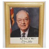 1048	JESSE HELMS FRAMED PHOTO W/ATTRIBUTED SIGNATURE ON PHOTO, APPROXIMATELY 10 IN X 12 IN OVERALL