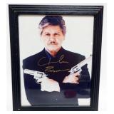 1050	CHARLES BRONSON FRAMED PHOTO W/ATTRIBUTED SIGNATURE ON PHOTO, APPROXIMATELY 10 IN X 12 IN OVERA