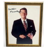 1060	RONALD REAGAN FRAMED PHOTO W/ATTRIBUTED SIGNATURE, APPROXIMATELY 9 IN X 11 IN OVERALL