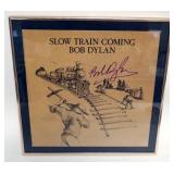 1129	BOB DYLAN FRAMED & MATTED ALBUM W/ATTRIBUTED SIGNATURE *SLOW TRAN COMING* APPROXIMATELY 15 IN X
