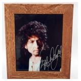 1135	BOB DYLAN FRAMED PHOTO W/ATTRIBUTED SIGNATURE, APPROXIMATELY 11 IN X 13 IN OVERALL