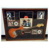 1160	BOB DYLAN COLLAGE IN SHADOW BOX FRAME INCLUDING ALBUM *HIGHWAY 61 REVISITED* PHOTOS, CDS & A FENDER MUSTANG GUITAR W/ATTRIBUTED SIGNATURES, APPROXIMATELY 44 IN X 37 IN X 4 IN OVERALL