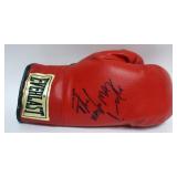 1193	EVERLAST BOXING GLOVE WITH SIGNATURE ATTRIBUTED TO MACHO CAMACHO