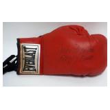 1194	EVERLAST BOXING GLOVE WITH SIGNATURE ATTRIBUTED TO JAKE LAMOTTA RAGING BULL