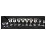 1022	WATERFORD CRYSTAL ASSORTMENT INCLUDING 7 - 6 IN WINES AND 2 - 3 1/2 IN CORDIALS AND 2 - 5 IN CA