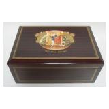 1043	CIGAR HUMIDOR, ROMEO AND JULIET 125TH ANNIVERSARY, APPROXIMATELY 14 IN X 9 1/2 IN X 7 IN H