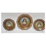1047	GERMAN HAND PAINTED PORTRAIT PLATES WITH RETICULATED EDGES, LARGEST APPROXIMATELY 9 1/2 IN