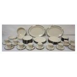 1064	LENOX SOLITAIRE MILLENNIUM EDITION 64 PC. DINNERWARE SET, 12 - 8 1/4 IN PLATES; 12 - 10 3/4 IN 