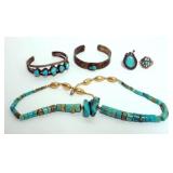 1128	TURQUOISE AND STERLING JEWELRY INCLUDING 2 RINGS, 2 BRACELETS AND 1 NECKLACE. ONLY 1 RING WITH 