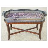 1166	ORNATE SILVER PLATE TRAY WITH FAUX TORTISE SHELL INSET ON MAHOGANY STAND, APPROXIMATELY 27 IN X