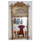 1186	FAUX BAMBOO FRAME MIRROR WITH IMAGE OF STALKING LION AT TOP