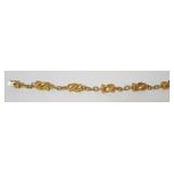 1072	18 K BRACELET MARKED 750, 22.25 DWT, APPROXIMATELY 8 IN L