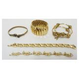 1081	5 GOLD TONE LADIES BRACELETS, 1 MARKED MONET, 1 NEEDS REPAIR