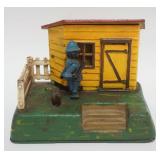 1085	BOOK OF KNOWLEDGE *UNCLE REMUS* MECHANICAL BANK, APPROXIMATELY 6 IN X 4 IN X 4 1/2 IN H