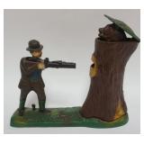 1088	BOOK OF KNOWLEDGE *TEDDY AND THE BEAR* MECHANICAL BANK, APPROXIMATELY 10 IN X 3 IN X 9 IN H