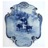 1022	LARGE ROYAL DELFT PLAQUE CA 1900 W/IMAGE OF COWS BEING HERDED DOWN COUNTRY PATH, APPROXIMATELY 