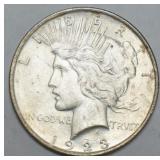 1101	1928 PEACE SILVER DOLLAR