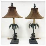 1191	PAIR OF FIGURAL METAL TABLE LAMPS WITH MONKEYS EATING BANANAS AT BASE OF TREE, EACH APPROXIMATE