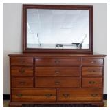 1211	THE  WELSH VALLEY COLLECTION BY THOMASVILLE, 12 DRAWER SOLID CHERRY LOW CHEST WITH MIRROR. CHES