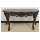 1225	ORNATE CARVED FLIP TOP WALNUT TABLE WITH PIERCED CARVED UNDER CARRIAGE, CLOSED APPROXIMATELY 60