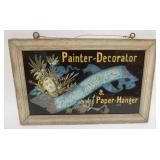 1038	REVERSE PAINTED ON GLASS PAPER HANGER'S SIGN IN WOOD FRAME, APPROXIMATELY 13 IN X 20 IN OVERALL